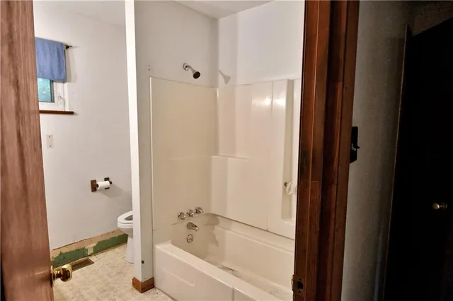 a bathroom with a bathtub