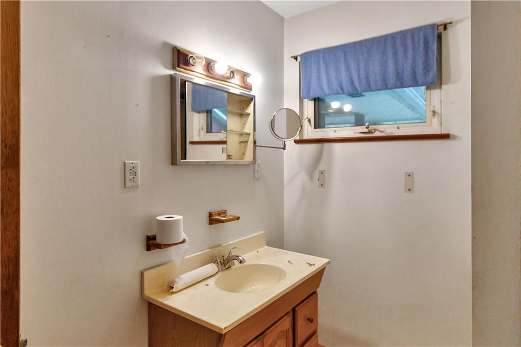 222 Gas Company Road Mount Morris, PA 15349 - Photo 26 of 34 a bathroom with a sink and a mirror
