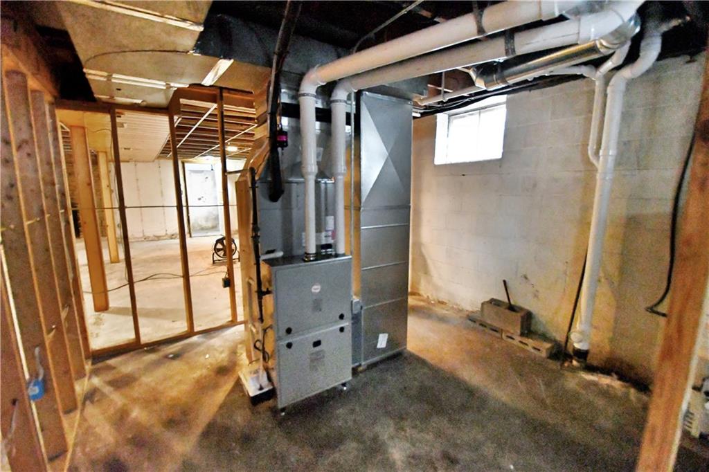 222 Gas Company Road Mount Morris, PA 15349 - Photo 34 of 34 a view of walk in closet with clothes and shoes