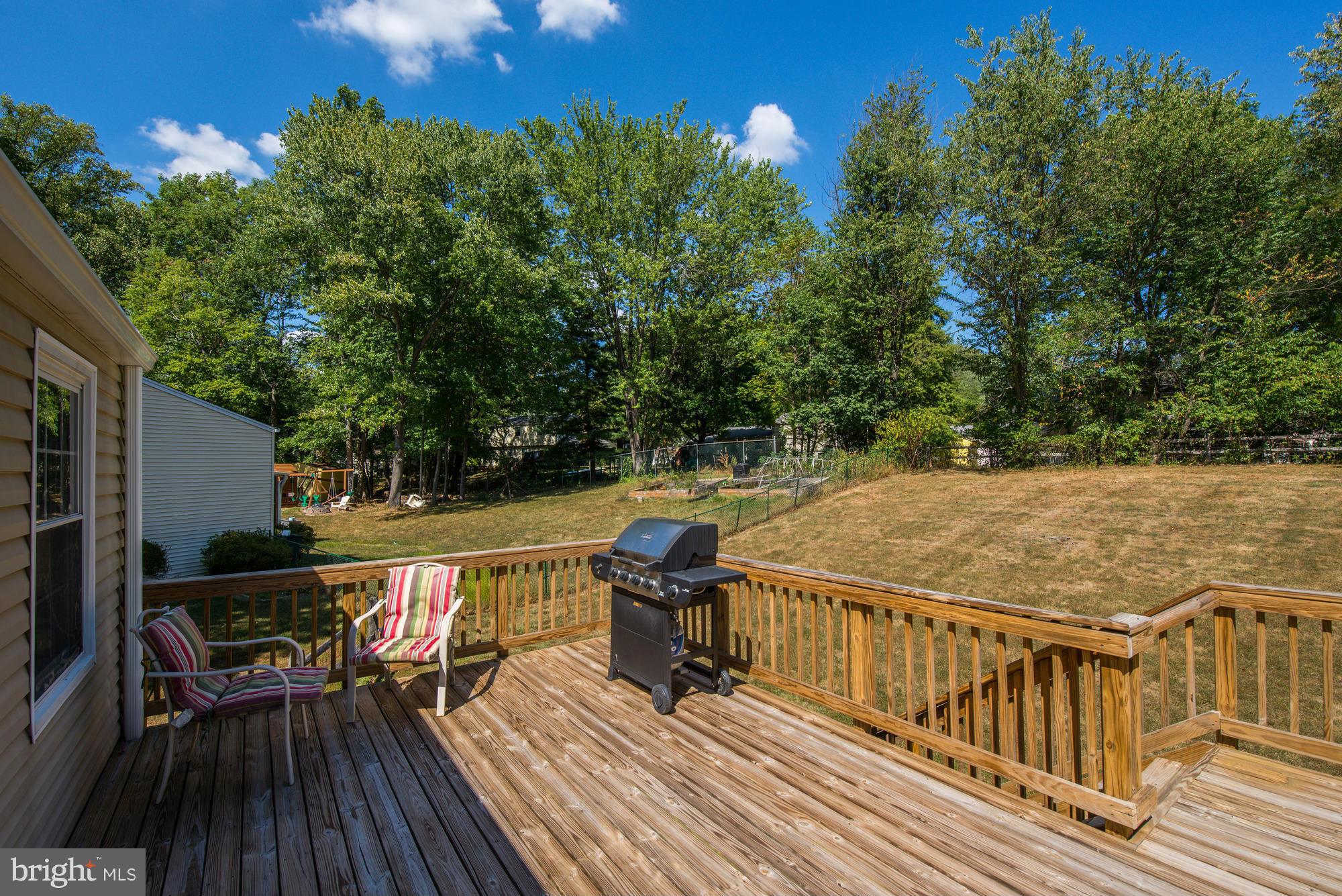 1312 Wembrough Court Silver Spring, MD 20905 - Photo 22 of 28 a view of a balcony with wooden floor and seating space