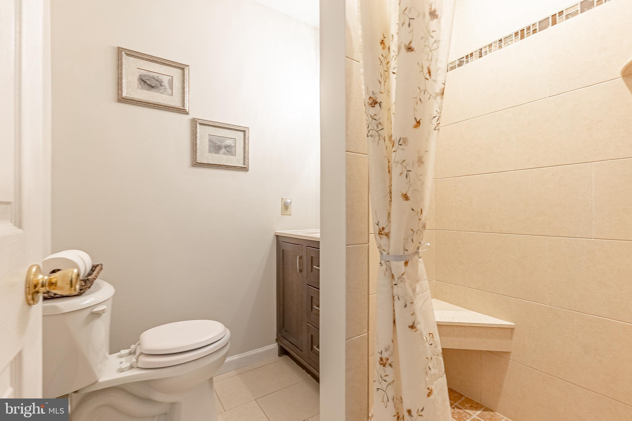 215 West Rose Valley Road Wallingford, PA 19086 - Photo 42 of 77 Main Level - Primary Full Bathroom