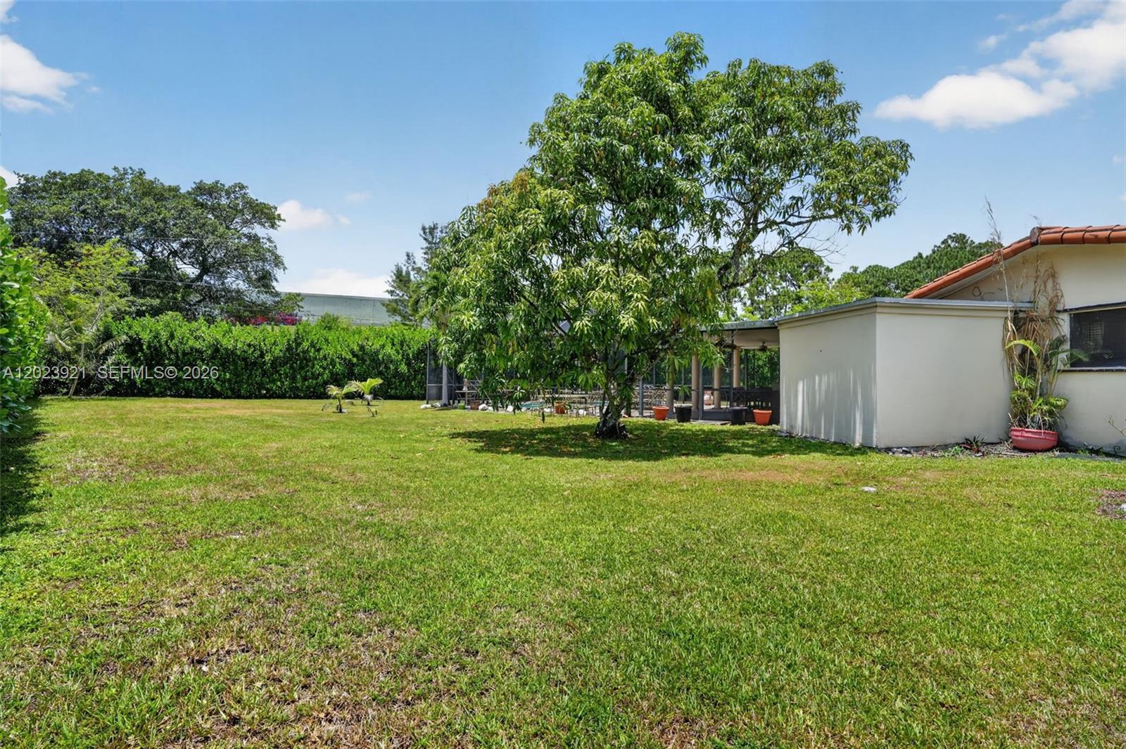 8461 Southwest 68th St Road Miami, FL 33143 - Photo 11 of 65 a view of a house with backyard and garden