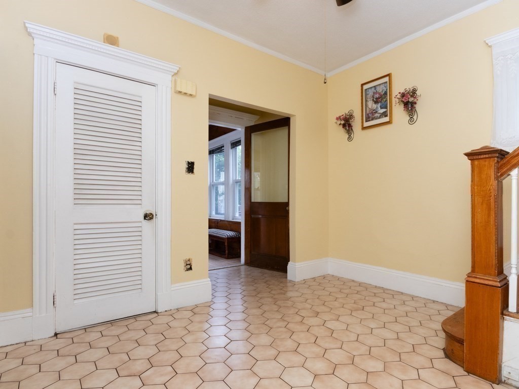 55 Baker Road Everett, MA 02149 - Photo 3 of 27 a view of a hallway with closet and bathroom