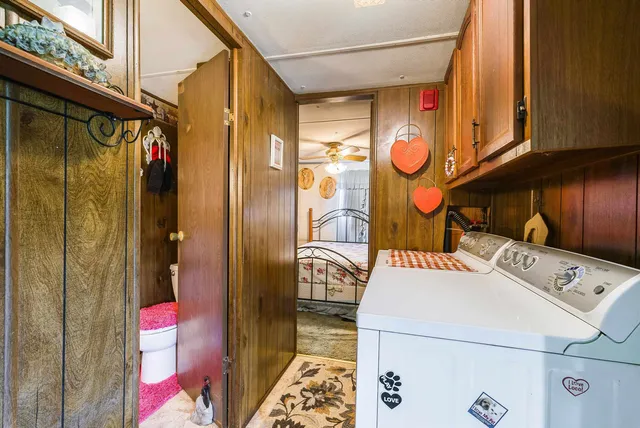 a utility room with dryer and washer