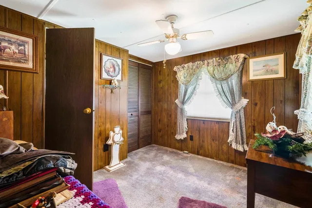 a bathroom with a sink a mirror and a shower