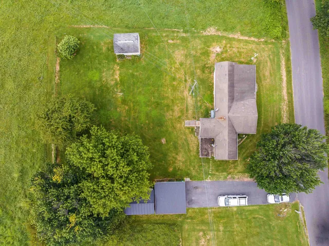 a view of a lake with a yard