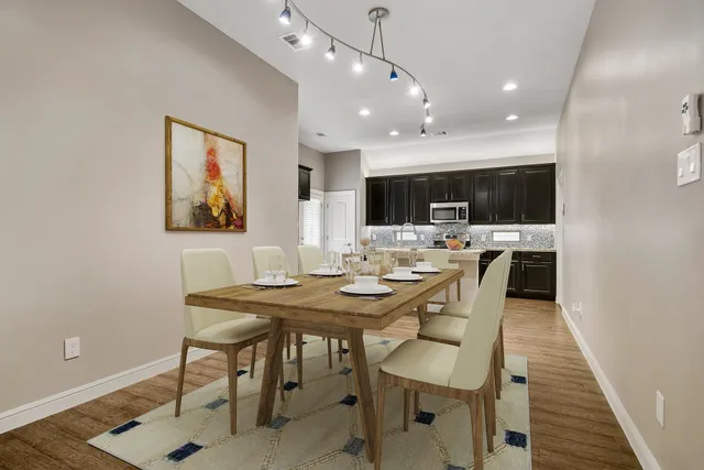 a view of a dining room with furniture
