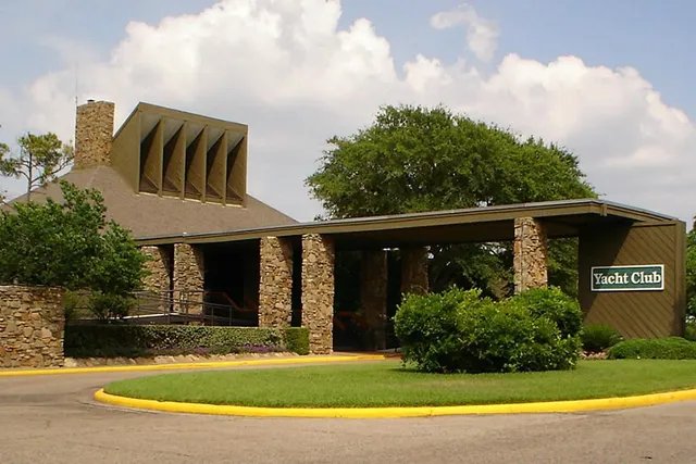 a view of backyard with swimming pool and outdoor seating