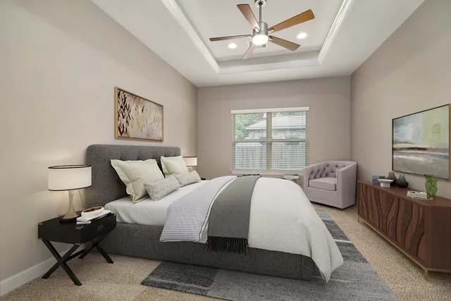 a bedroom with bed and window