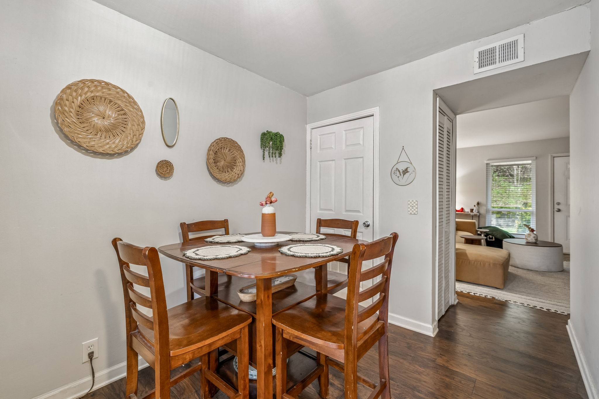 500 Paragon Mills Road, Unit E6 Nashville, TN 37211 - Photo 11 of 43 a view of a dining room with furniture and a chandelier
