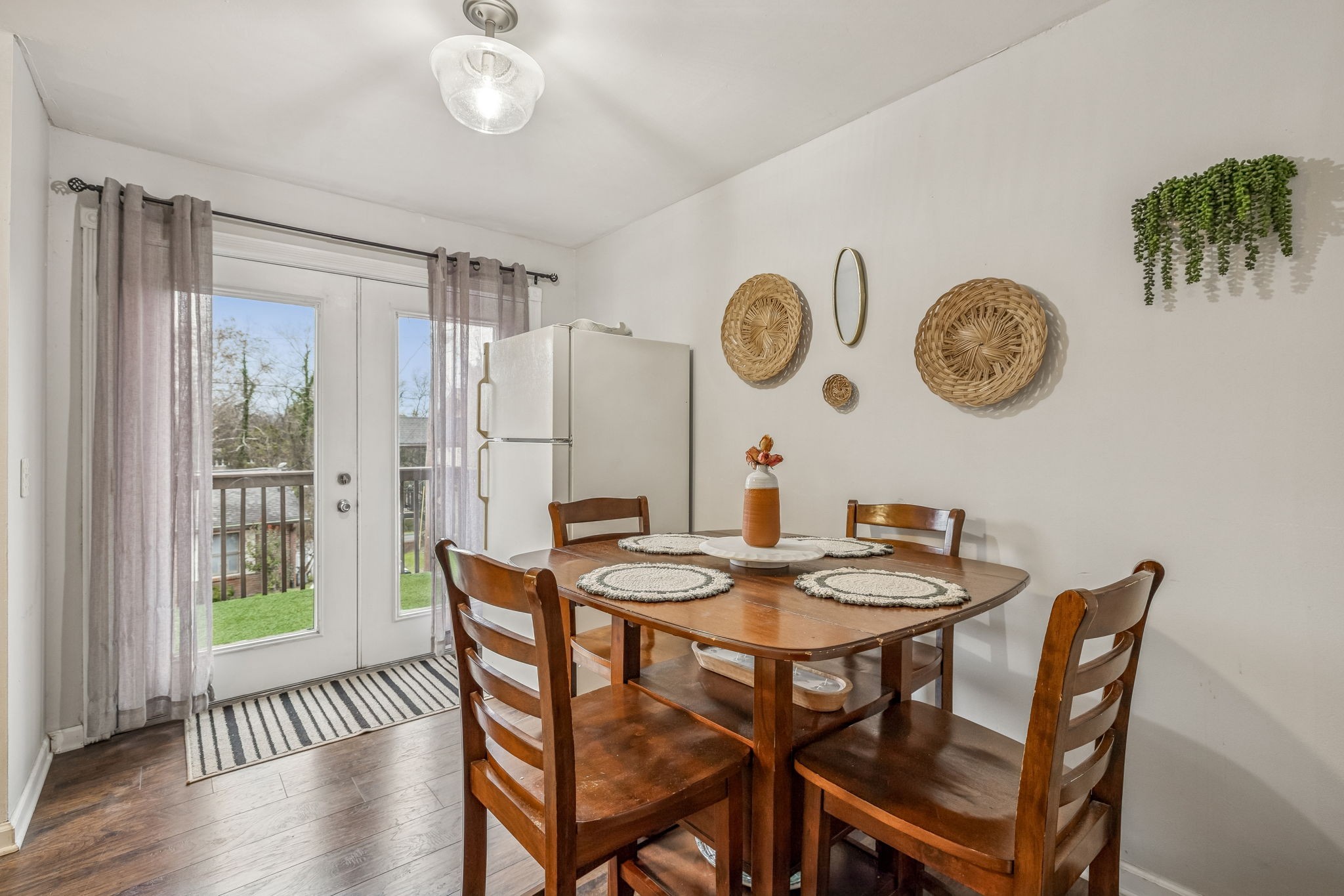 500 Paragon Mills Road, Unit E6 Nashville, TN 37211 - Photo 13 of 43 a view of a dining area with furniture and a large window