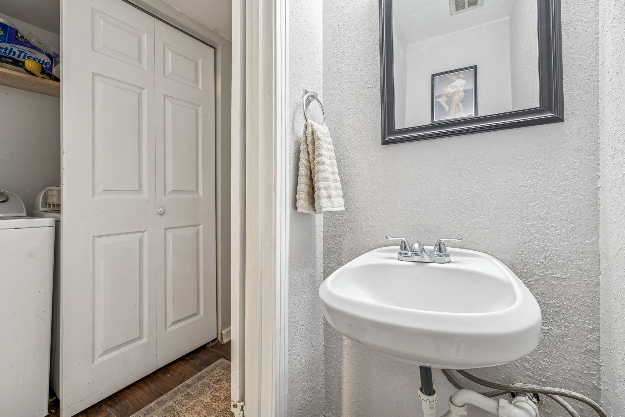 500 Paragon Mills Road, Unit E6 Nashville, TN 37211 - Photo 18 of 43 a bathroom with a sink and a mirror