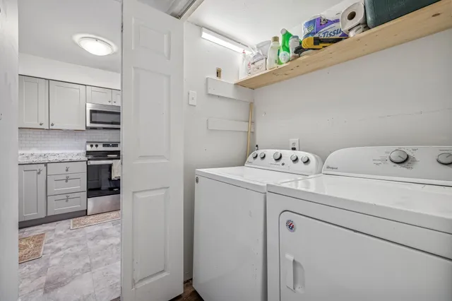 a utility room with dryer and washer