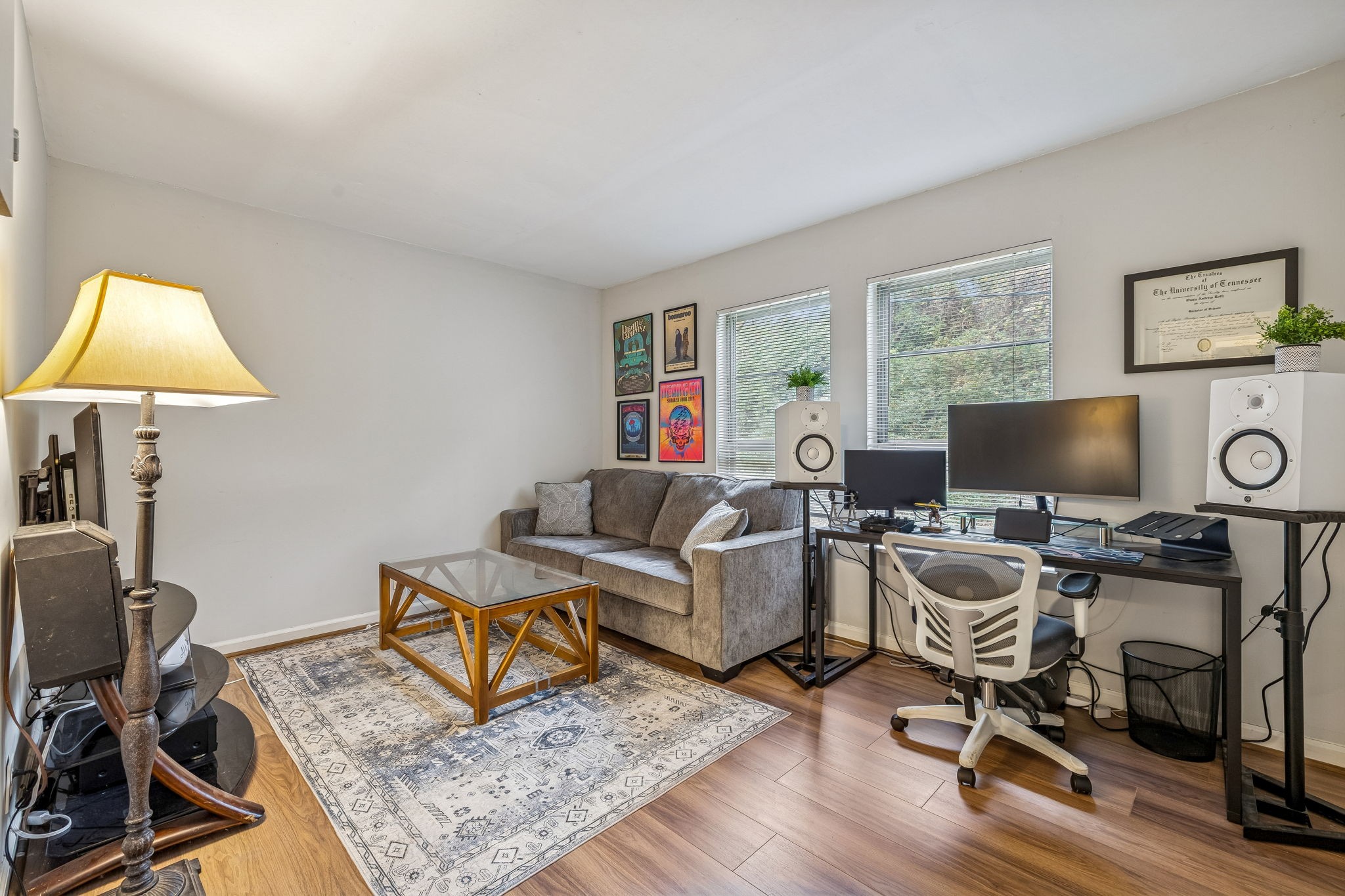 500 Paragon Mills Road, Unit E6 Nashville, TN 37211 - Photo 20 of 43 a living room with furniture and a flat screen tv