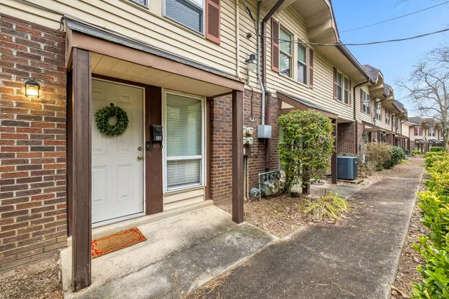 a view of a building with brick walls
