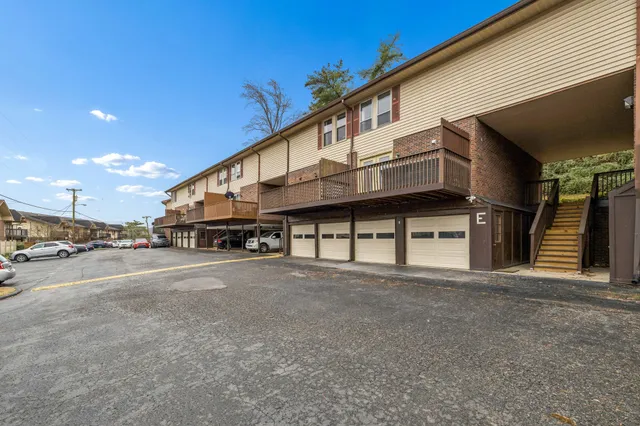 a view of a house with a street