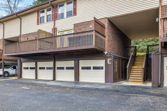 a front view of a house with a garage