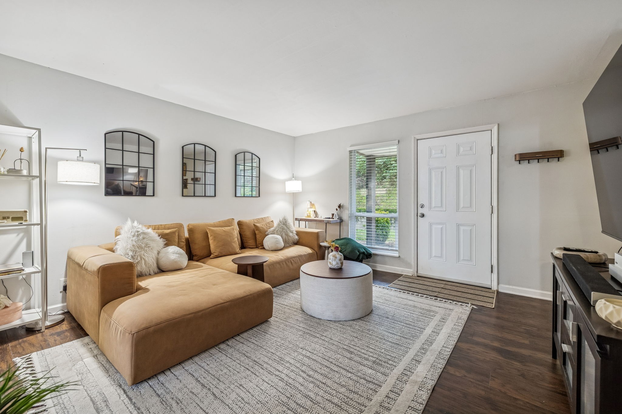 500 Paragon Mills Road, Unit E6 Nashville, TN 37211 - Photo 6 of 43 a living room with furniture and wooden floor