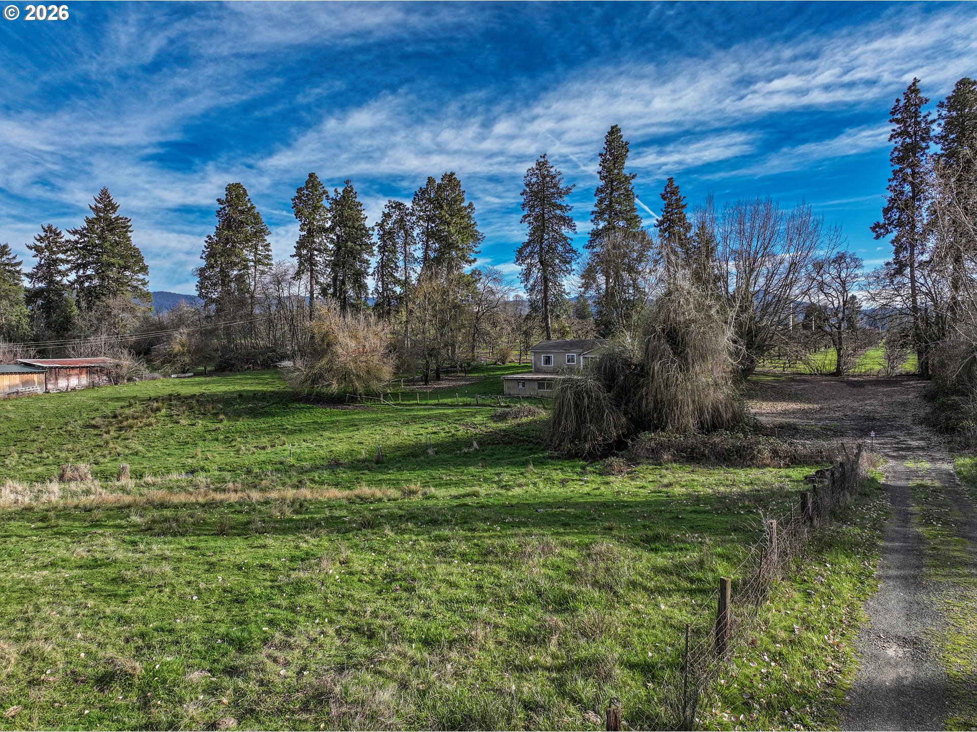 a view of a golf course with a yard