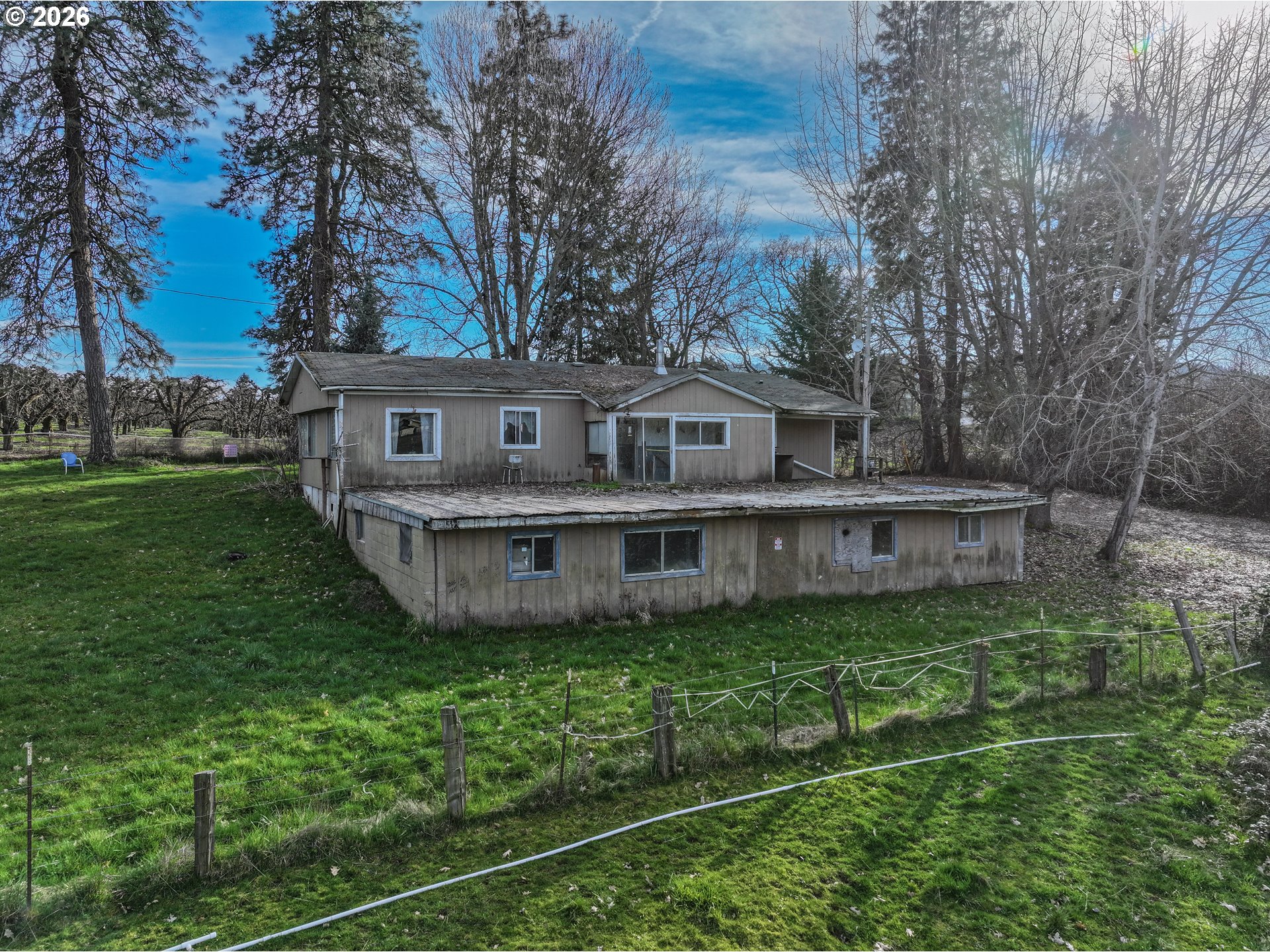 2739 Wyeast Road Hood River, OR 97031 - Photo 23 of 28 a view of a house with a yard and sitting area