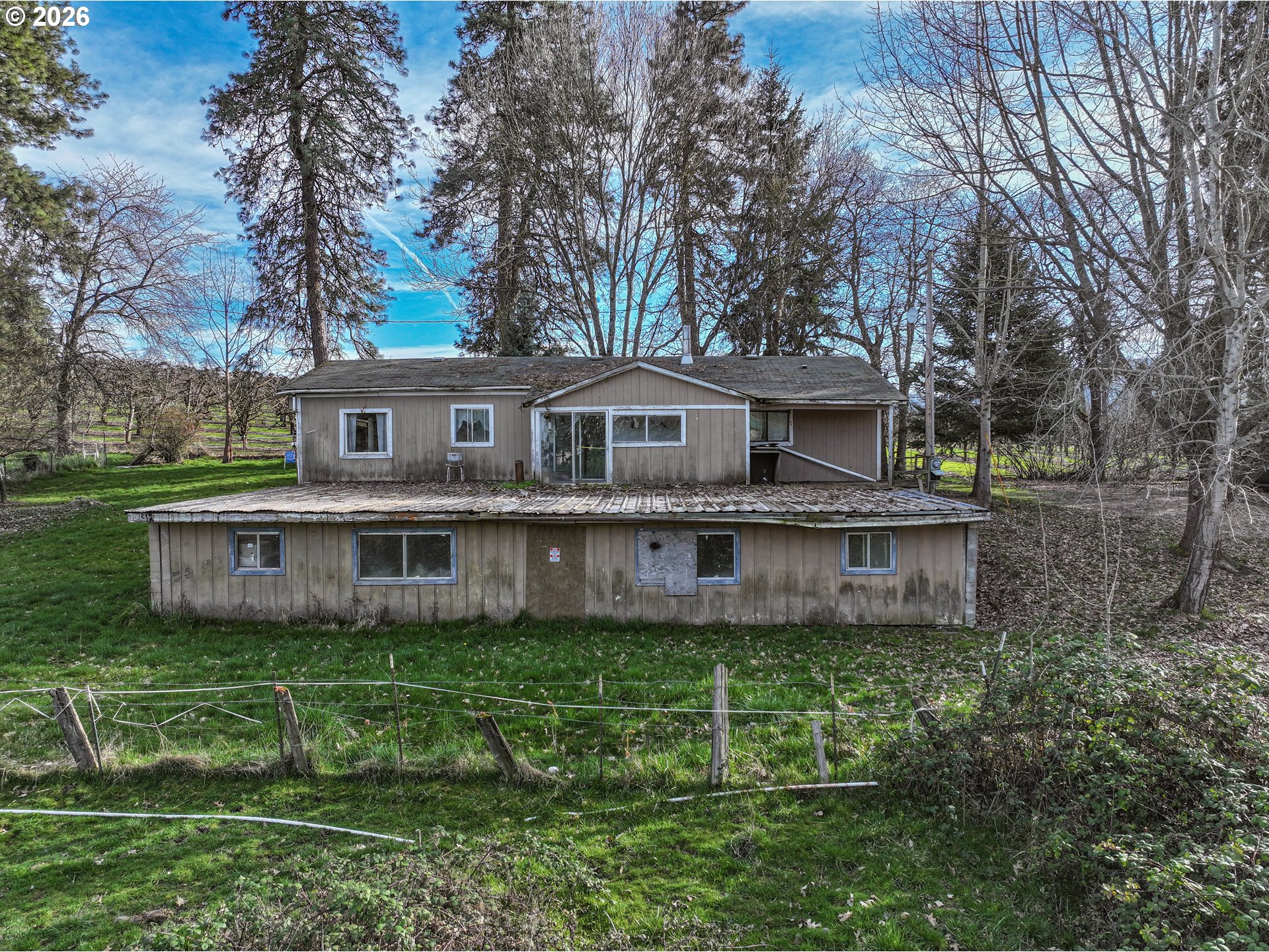2739 Wyeast Road Hood River, OR 97031 - Photo 24 of 28 a view of a house with a yard and sitting area