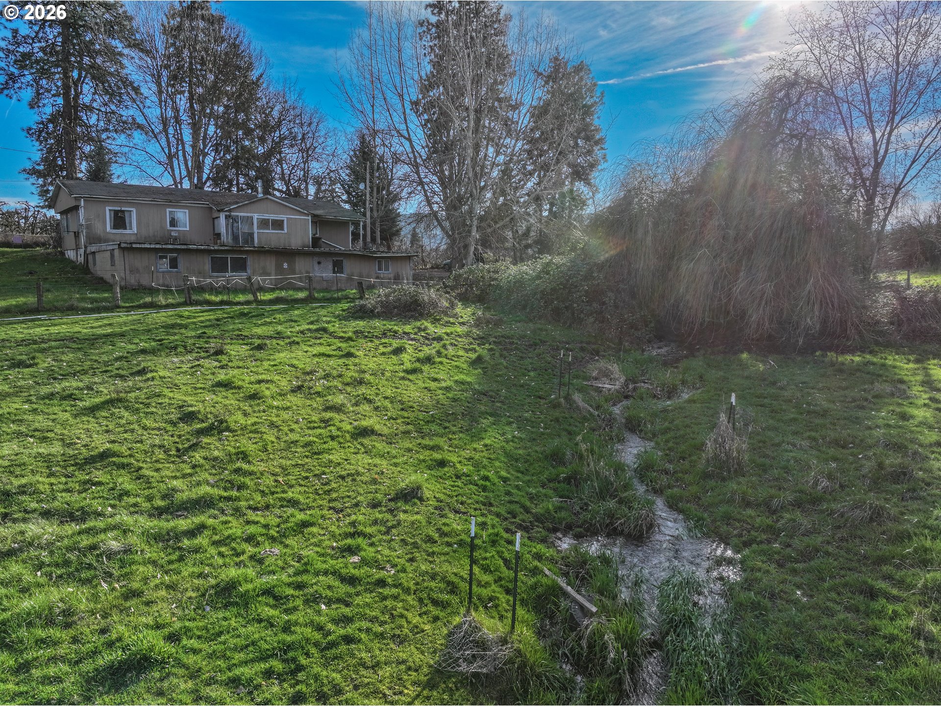 2739 Wyeast Road Hood River, OR 97031 - Photo 26 of 28 a view of a yard with a house