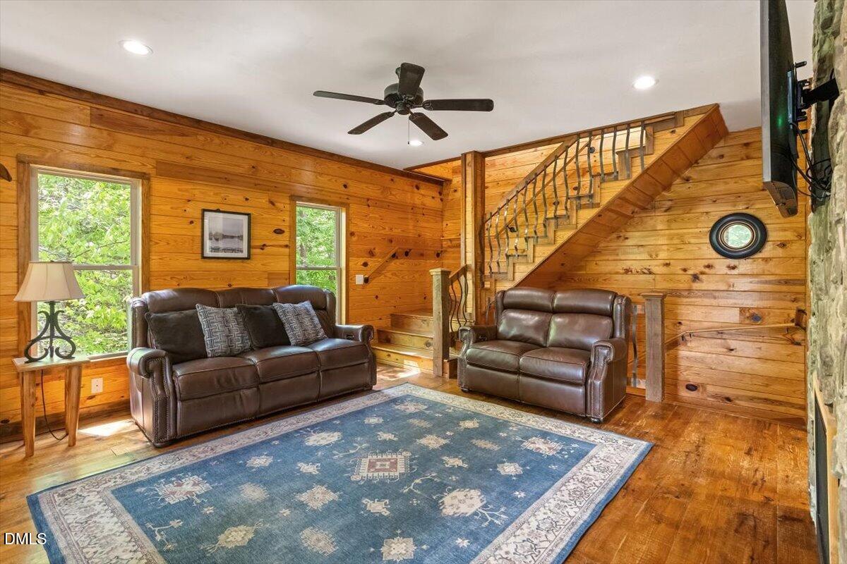 160 Stillwater Lane Roxboro, NC 27574 - Photo 13 of 57 a living room with furniture and a rug