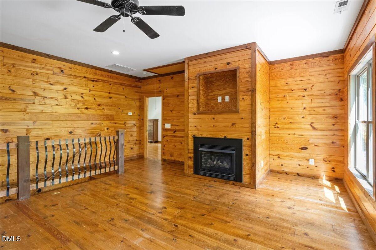 160 Stillwater Lane Roxboro, NC 27574 - Photo 20 of 57 a view of livingroom with fireplace and chandelier fan
