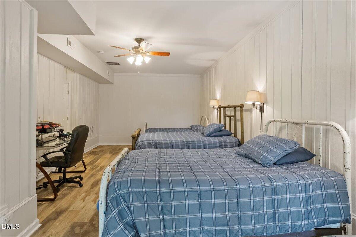 160 Stillwater Lane Roxboro, NC 27574 - Photo 27 of 57 a bedroom with a bed a desk and chair