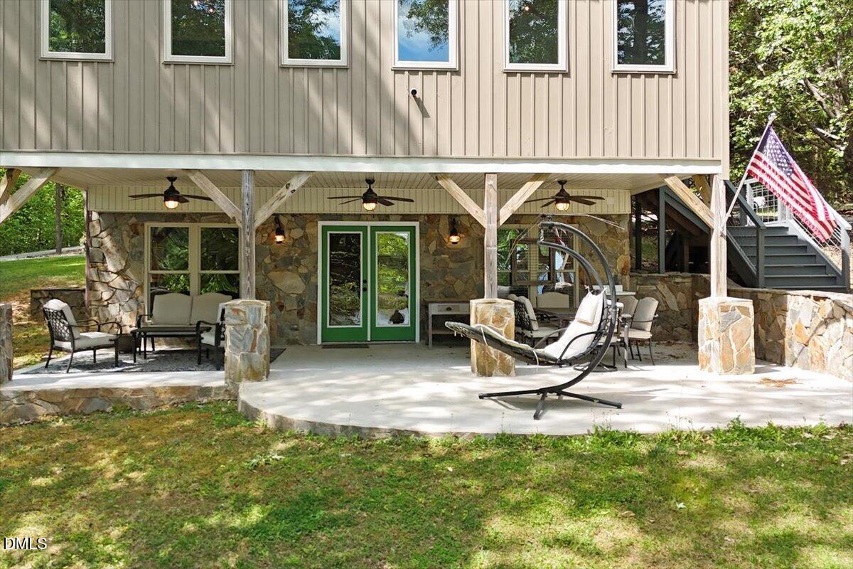 160 Stillwater Lane Roxboro, NC 27574 - Photo 32 of 57 a view of a lounge chair in the patio