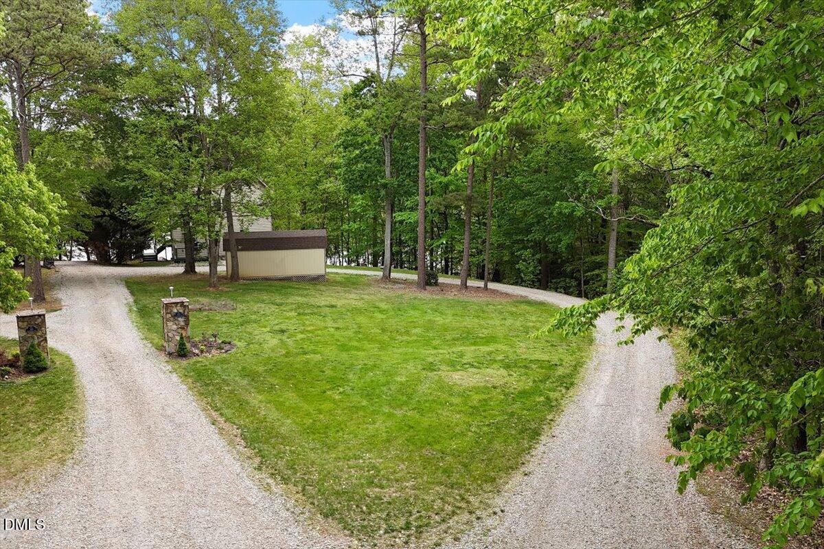 160 Stillwater Lane Roxboro, NC 27574 - Photo 37 of 57 a view of a park with large trees