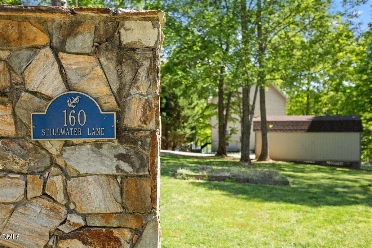 160 Stillwater Lane Roxboro, NC 27574 - Photo 46 of 57 a view of a tree in front of a house