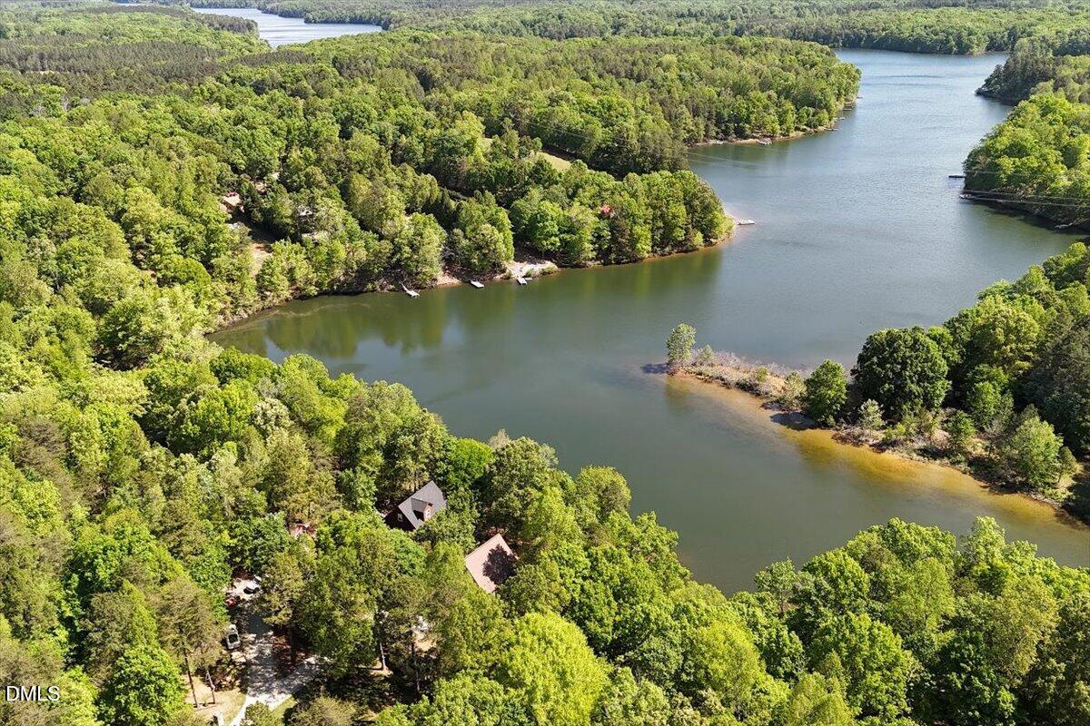 160 Stillwater Lane Roxboro, NC 27574 - Photo 53 of 57 an aerial view of a houses with a lake view