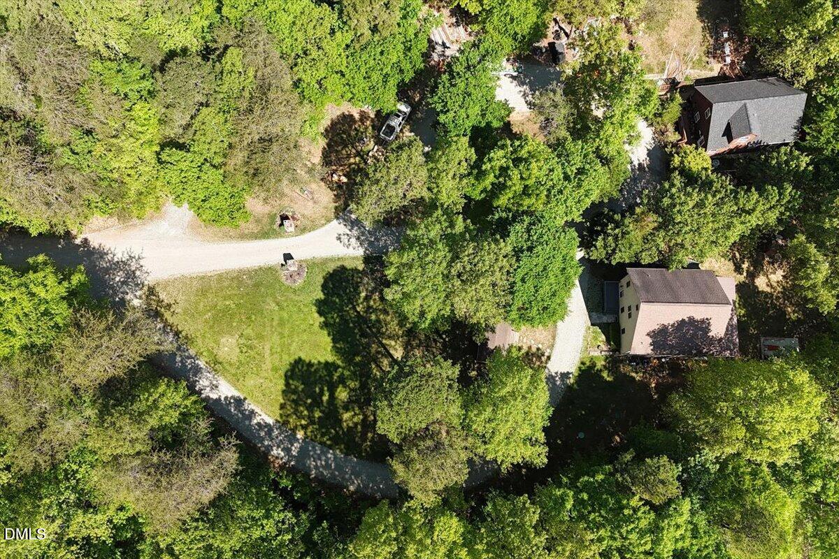 160 Stillwater Lane Roxboro, NC 27574 - Photo 56 of 57 an aerial view of a house with a yard