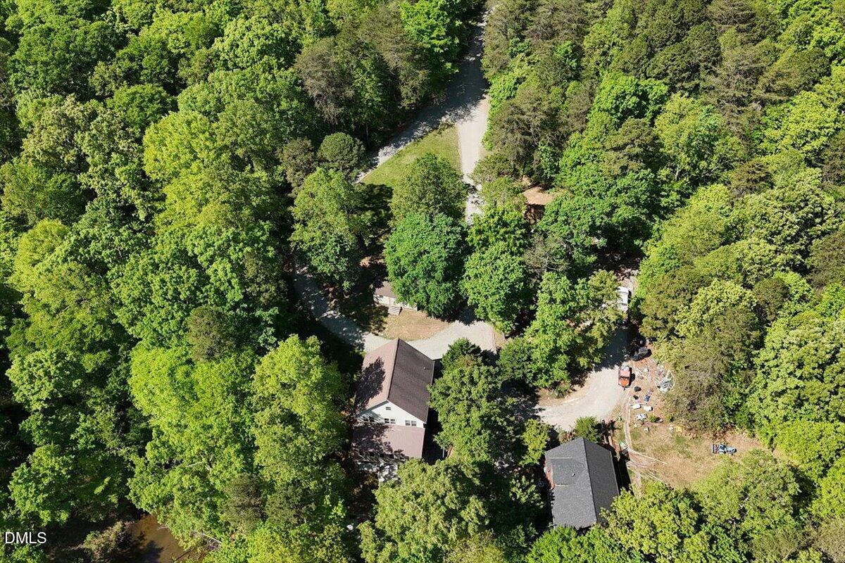 160 Stillwater Lane Roxboro, NC 27574 - Photo 57 of 57 an aerial view of residential house with outdoor space and trees all around