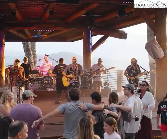 a living room with patio furniture