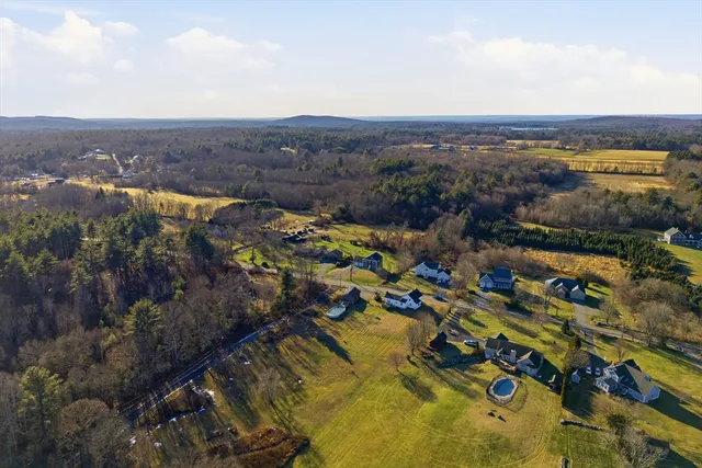 a view of a swimming pool with a lake view