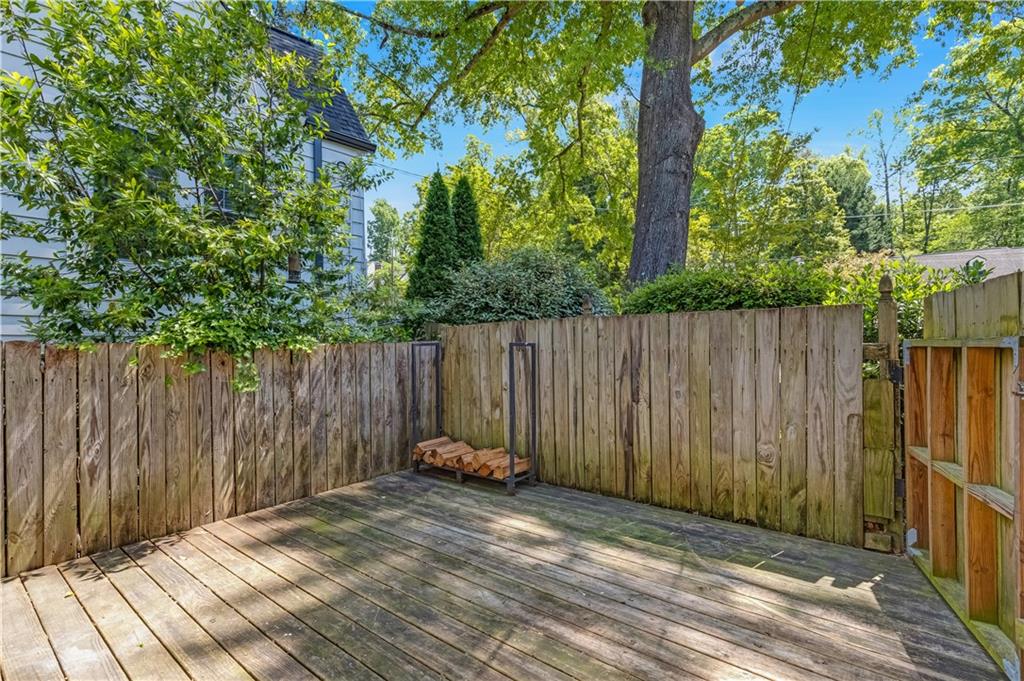 449 Nelson Ferry Road Decatur, GA 30030 - Photo 21 of 29 a view of outdoor space with wooden fence