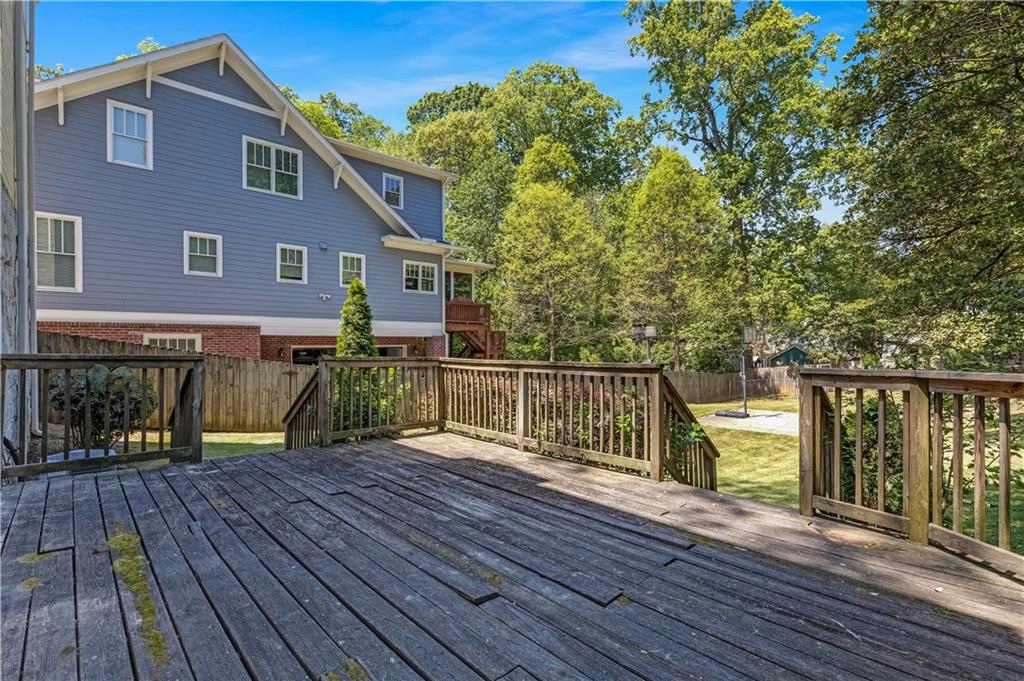 449 Nelson Ferry Road Decatur, GA 30030 - Photo 22 of 29 a view of a house with wooden deck
