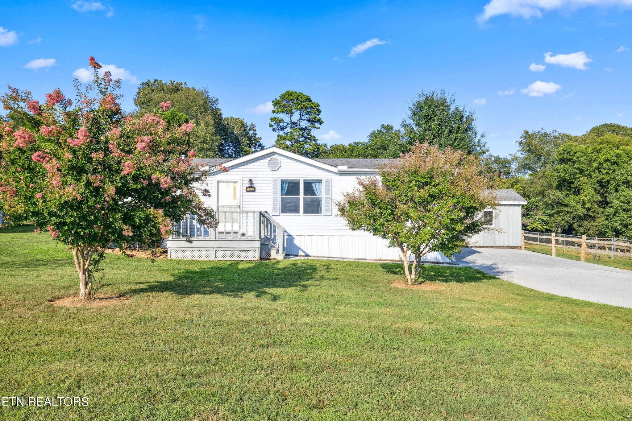 1022 Ridgeview Road Maryville, TN 37801 - Photo 1 of 24 a front view of a house with a yard
