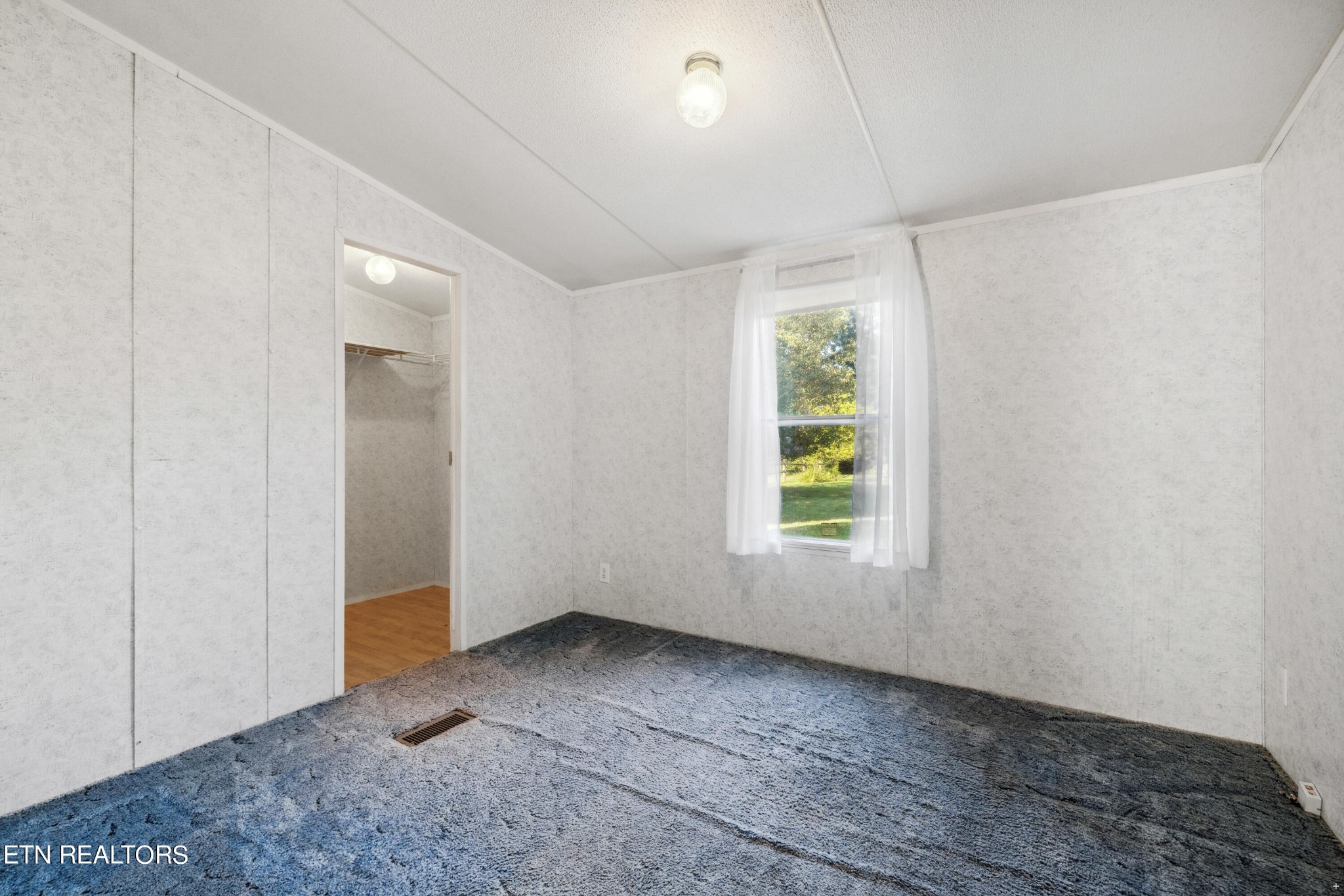1022 Ridgeview Road Maryville, TN 37801 - Photo 16 of 24 an empty room with windows