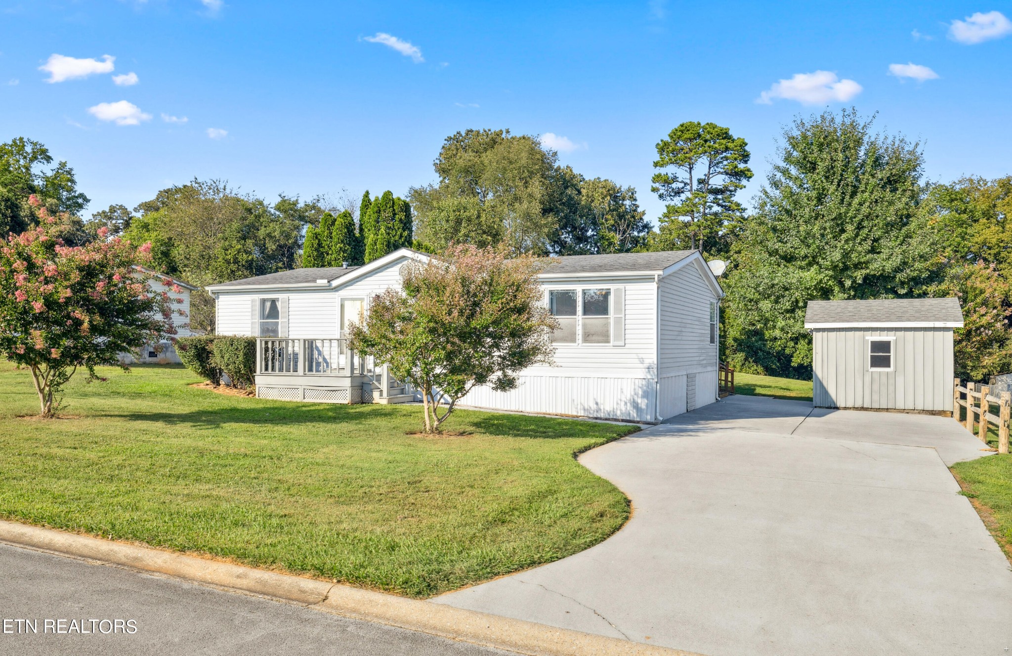 1022 Ridgeview Road Maryville, TN 37801 - Photo 24 of 24 a front view of a house with a yard and trees