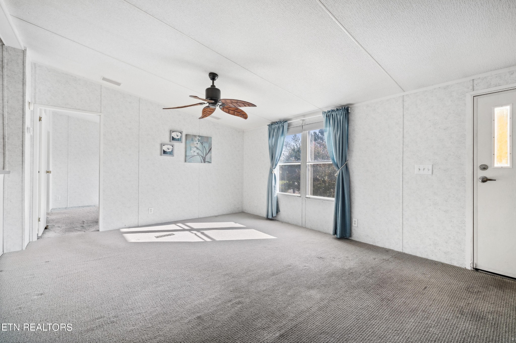 1022 Ridgeview Road Maryville, TN 37801 - Photo 3 of 24 a view of an empty room with a window