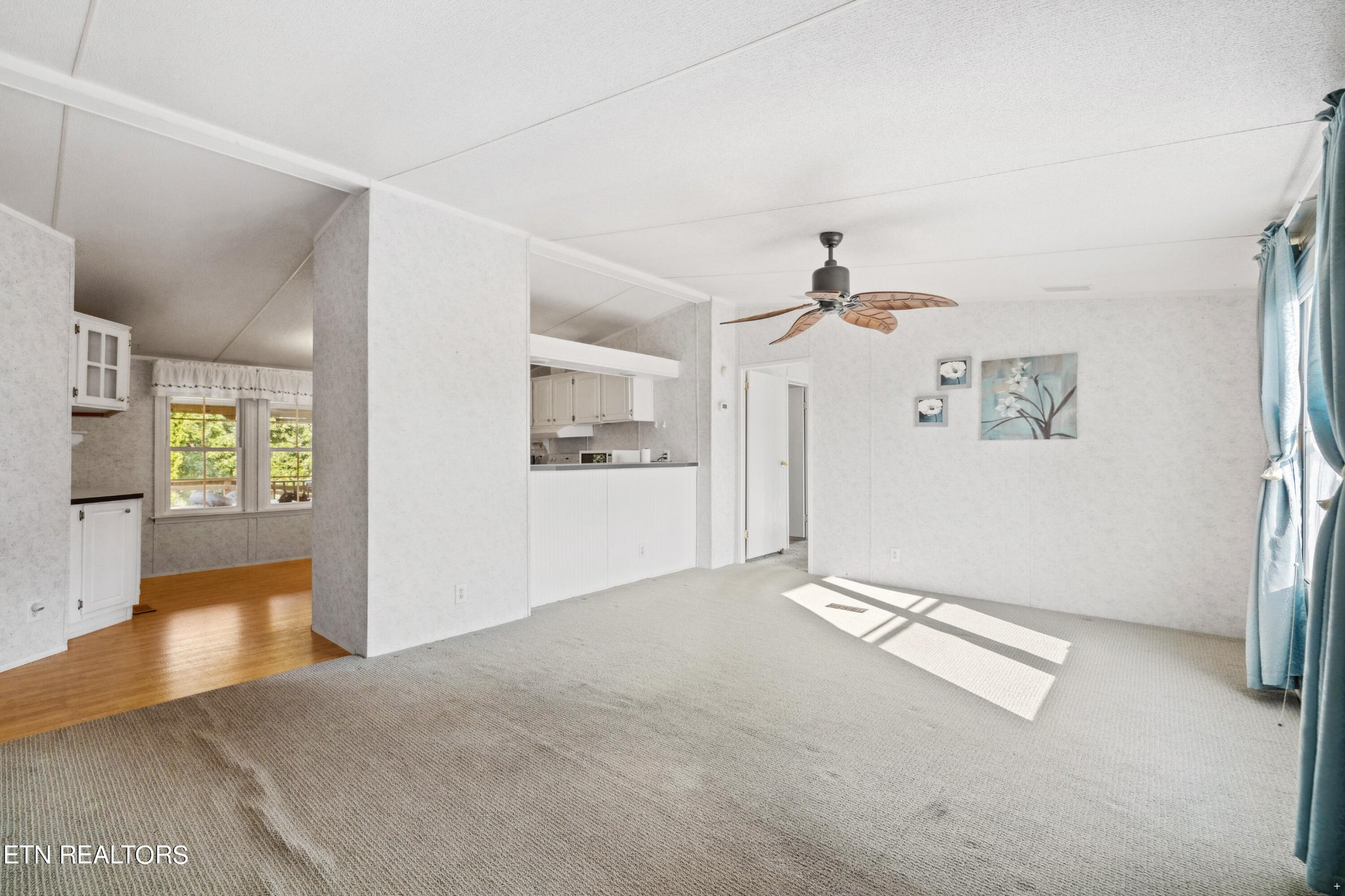 1022 Ridgeview Road Maryville, TN 37801 - Photo 9 of 24 wooden floor in an empty room with a window