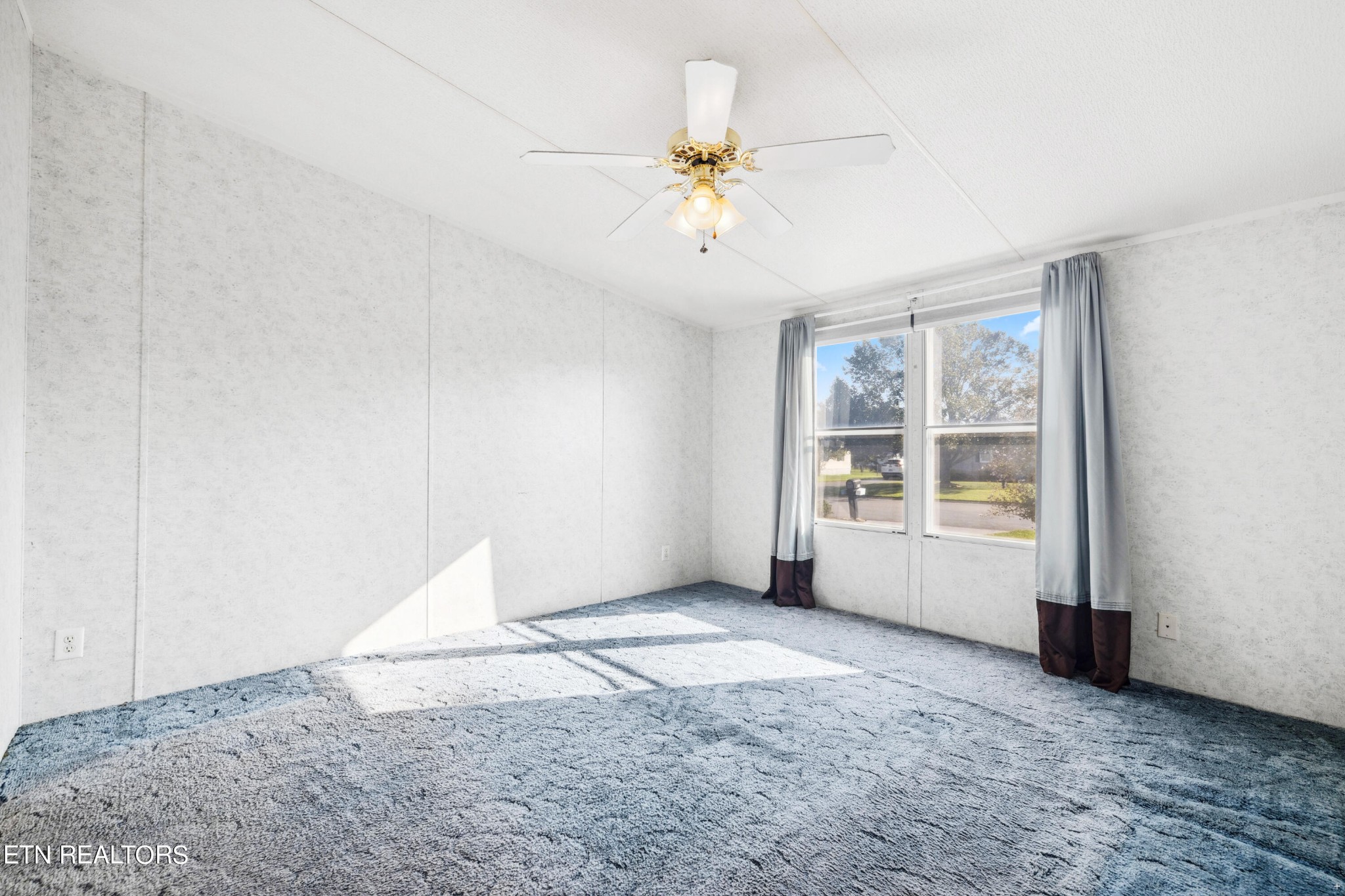 1022 Ridgeview Road Maryville, TN 37801 - Photo 10 of 24 a view of an empty room with a window