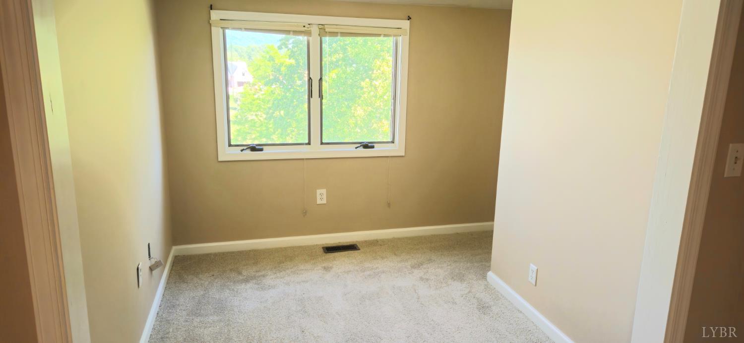 204 Shaker Lane Forest, VA 24551 - Photo 37 of 41 a view of an empty room with a window