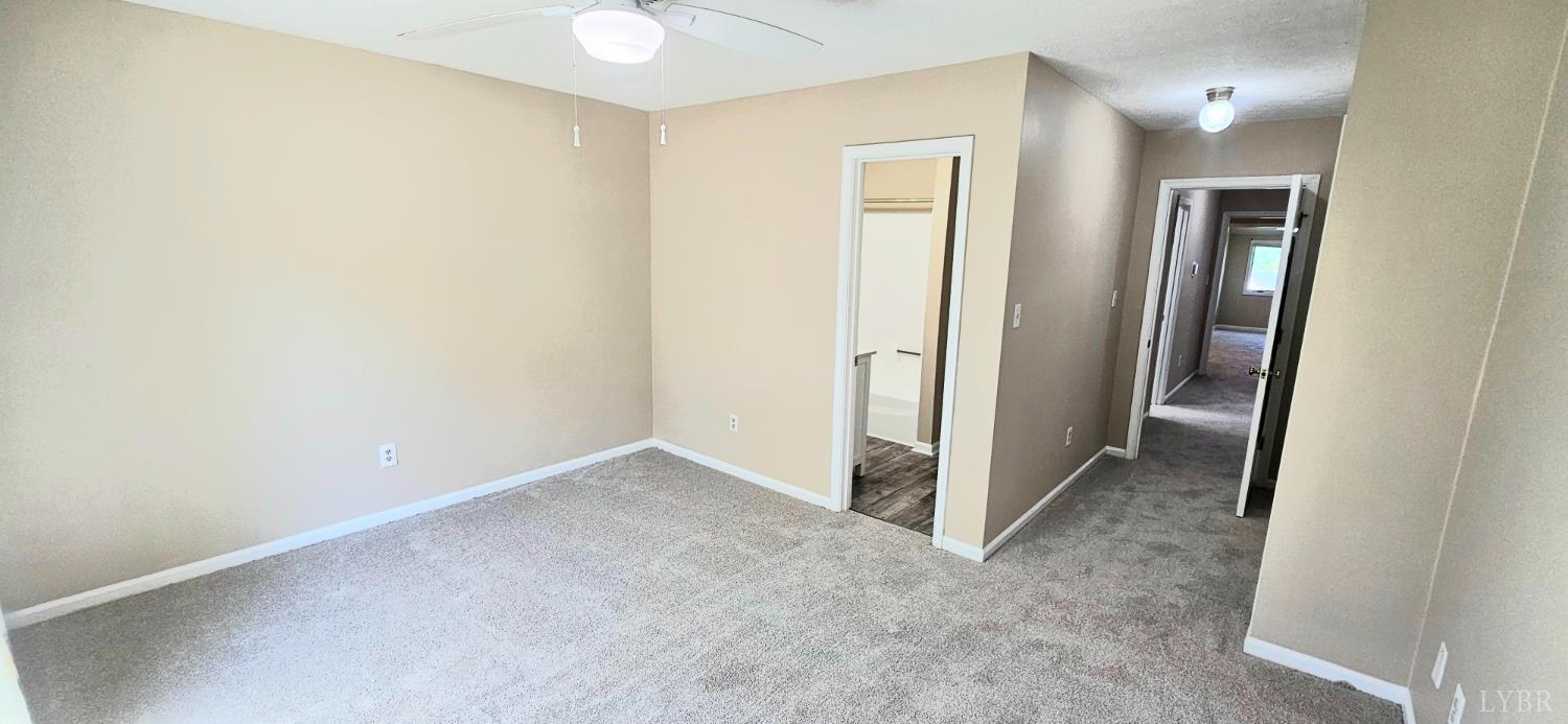 204 Shaker Lane Forest, VA 24551 - Photo 38 of 41 an empty room with windows and closet