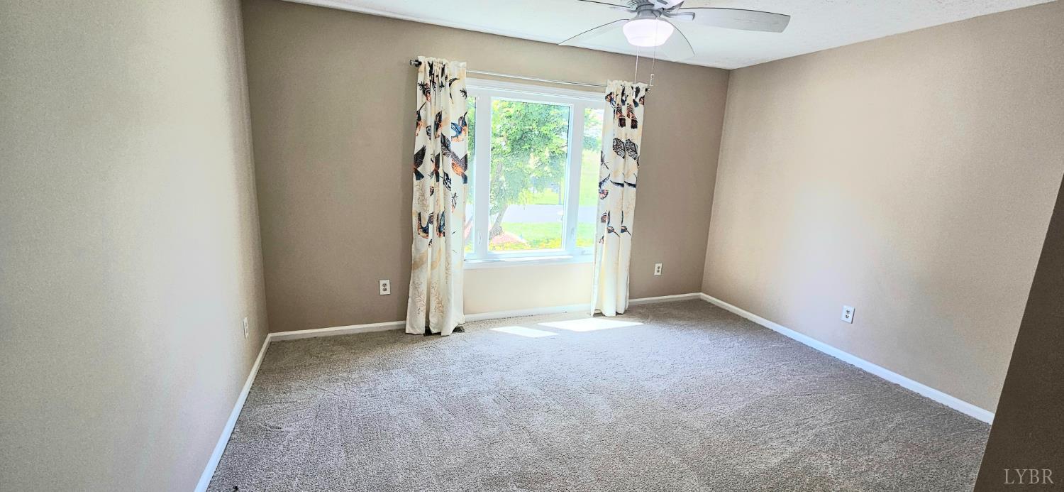 204 Shaker Lane Forest, VA 24551 - Photo 40 of 41 an empty room with a window