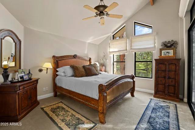 a bed room with a bed and a dresser