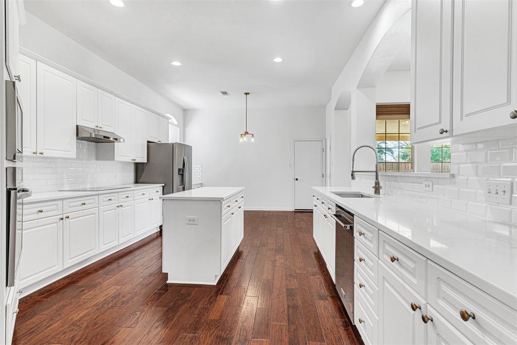 4332 Risinghill Drive Plano, TX 75024 - Photo 4 of 29 Just like the rest of the house, the kitchen is naturally light and bright, with just about everything elegantly updated. Dishwasher was replaced in 2024. A large walk-in pantry and utility room are also handy to the kitchen.